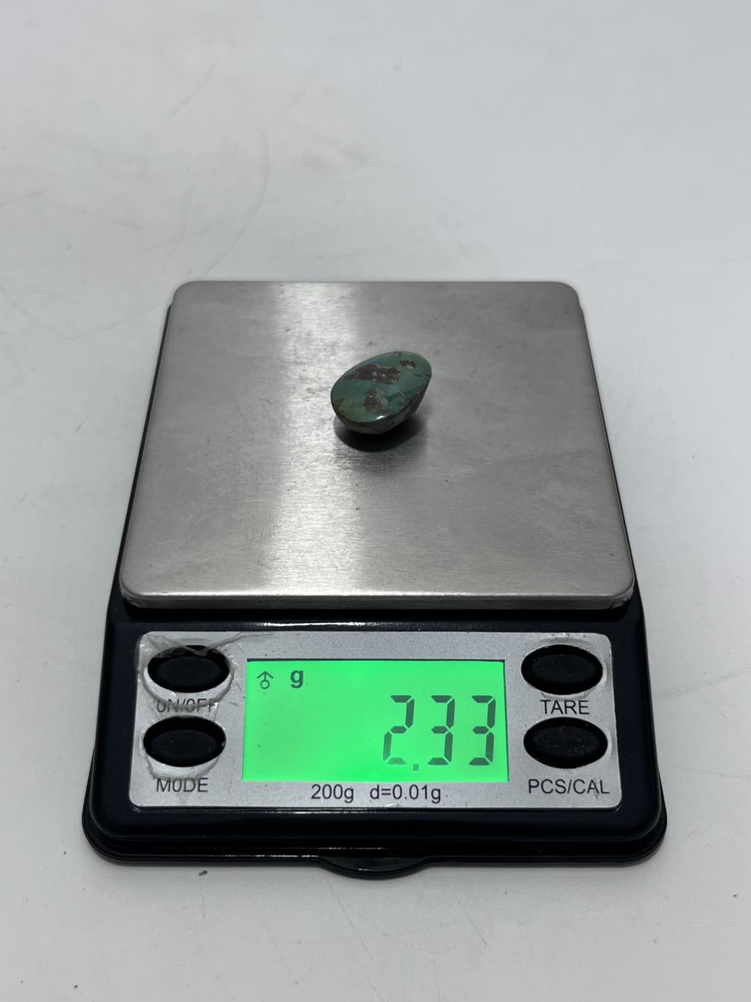 Okyanus Temalı Doğal Kabaşon Firuze Taşı 11,5 Karat - Turkuaz Taşı 2,32 Gram Okyanus Temalı Doğal Kabaşon Firuze Taşı 11,5 Karat - Turkuaz Taşı 2,32 Gram