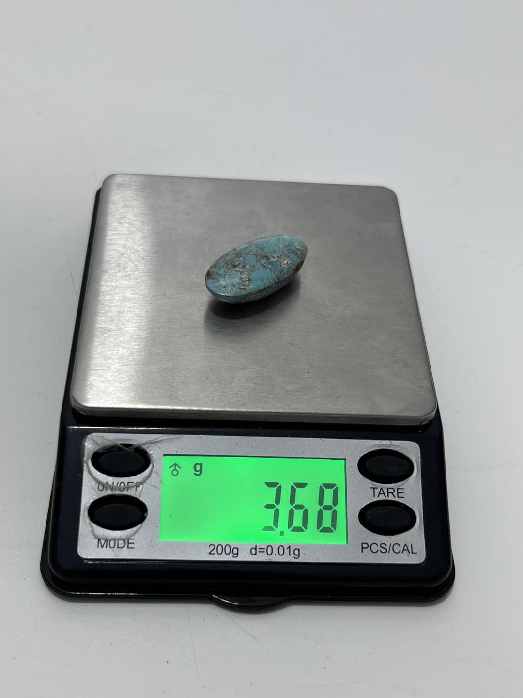 Okyanus Temalı Doğal Kabaşon Firuze Taşı 18,3 Karat - Turkuaz Taşı 3,67 Gram Okyanus Temalı Doğal Kabaşon Firuze Taşı 18,3 Karat - Turkuaz Taşı 3,67 Gram