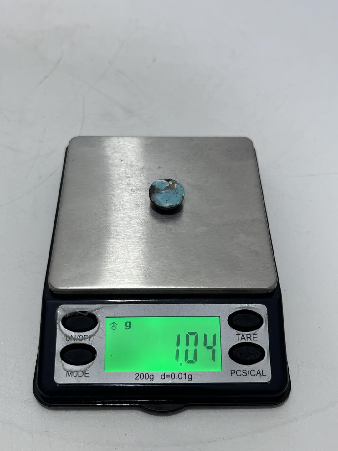 Okyanus Temalı Doğal Kabaşon Firuze Taşı 5,1 Karat - Turkuaz Taşı 1,03 Gram Okyanus Temalı Doğal Kabaşon Firuze Taşı 5,1 Karat - Turkuaz Taşı 1,03 Gram